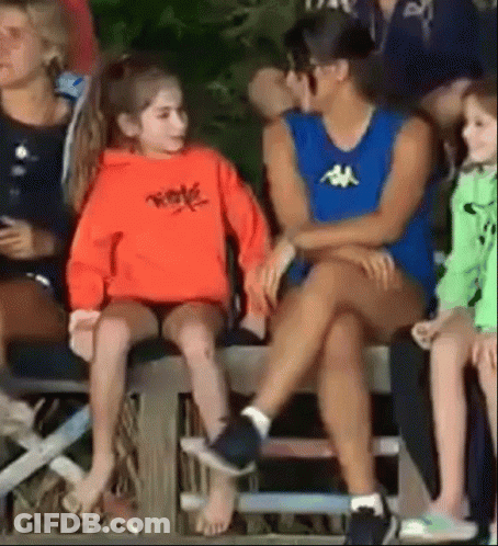 Woman And Little Girl Sitting On Bleacher GIF