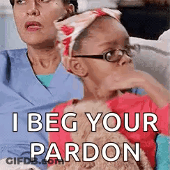 Woman And Little Girl Sitting On Couch With Teddy Bear GIF