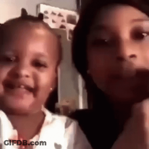 Woman And Little Girl Smiling GIF