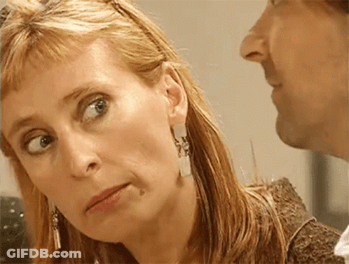Woman And Man Behind GIF