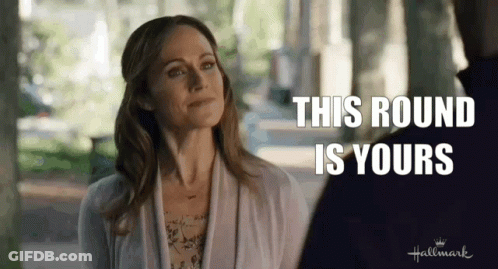 Woman And Man Hallmark Movie Saying This Round Is Yours GIF