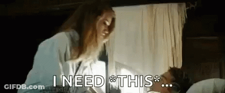 Woman And Man In Bed Saying I Need This GIF