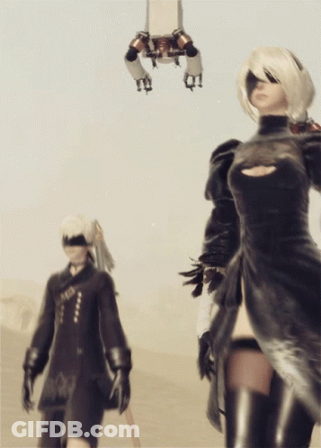 Woman And Man In Black Dresses GIF