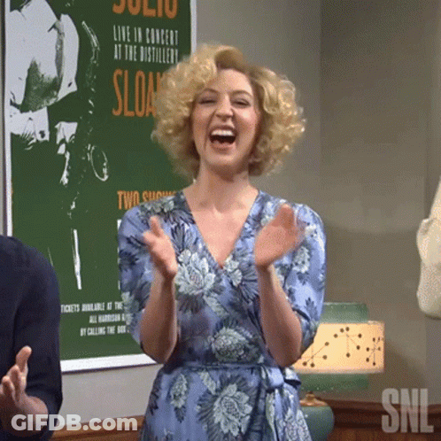 Woman Applauding In Front Of Sloan Poster GIF