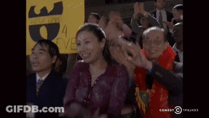 Woman Applauds Holding Ep Sign GIF