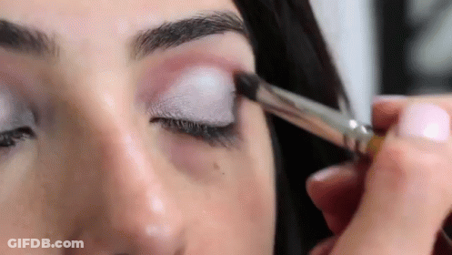 Woman Applying Eye Shadow With Brush GIF