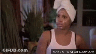 Woman Applying Face Mask GIF