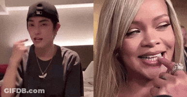 Woman Applying Lipstick To Man GIF