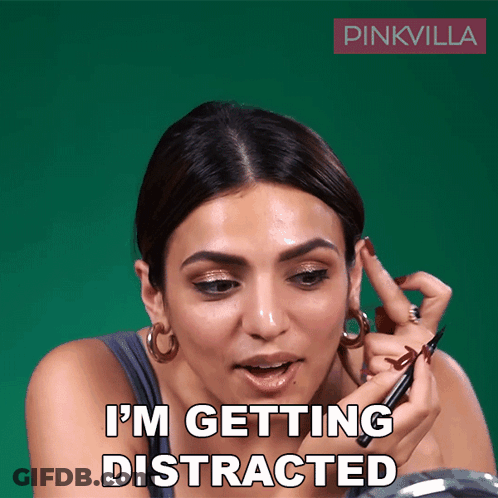Woman Applying Makeup Saying I'm Getting Distracted GIF