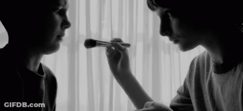 Woman Applying Makeup To Another GIF