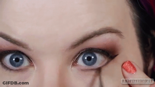 Woman Applying Makeup To Eye GIF