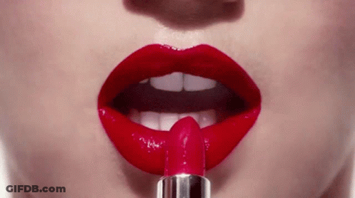 Woman Applying Red Lipstick GIF