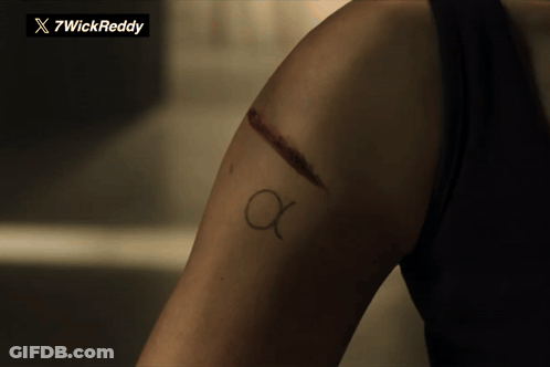 Woman Arm Tattoo Letter A GIF