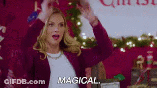 Woman Arms Up Saying Magical Christmas Tree GIF