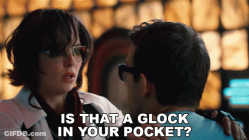 Woman Asking Man If There Is Glock In His Pocket GIF