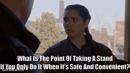 Woman Asking Man What's The Point Of Taking A Stand GIF