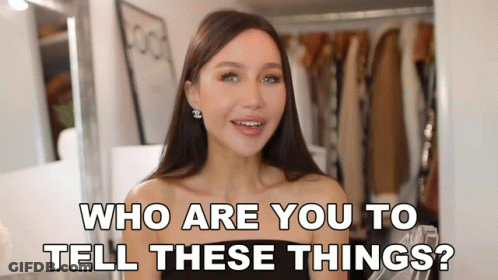 Woman Asking Who Are You With Chanel Earrings GIF