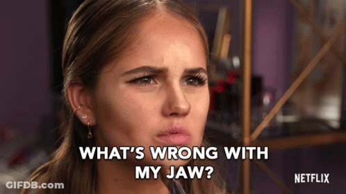 Woman Asks What's Wrong With My Jaw At Netflix Sign GIF