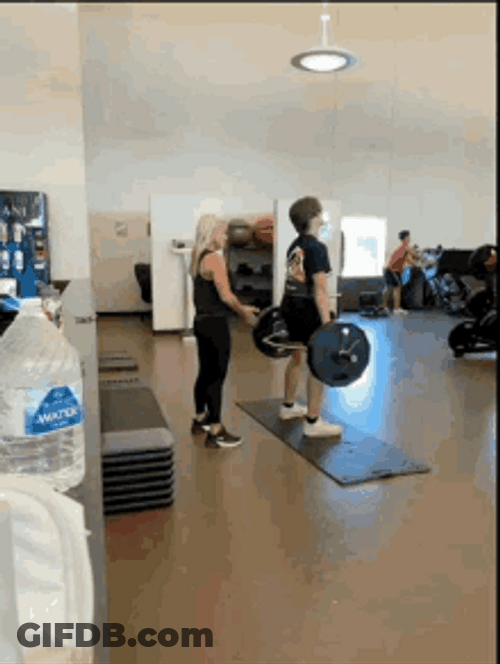 Woman Assisting Man With Deadlift GIF