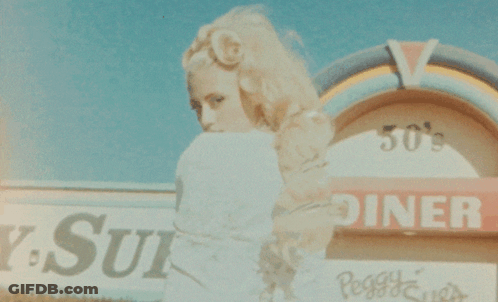 Woman At 50S Diner Sign GIF