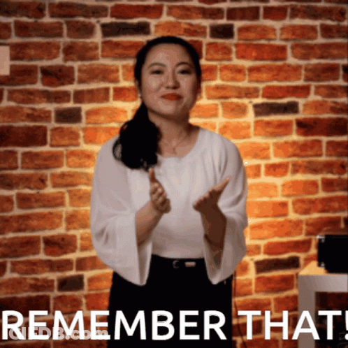 Woman At Brick Wall Remember That GIF