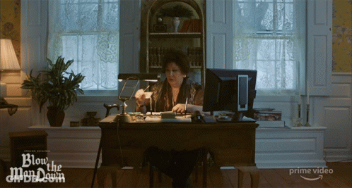 Woman At Computer With Blow The Man Down GIF