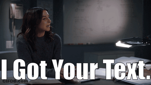 Woman At Desk I Got Your Text GIF