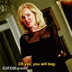 Woman At Desk Making Funny Face GIF