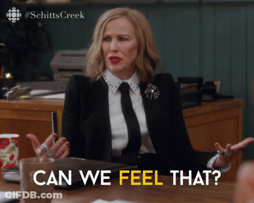 Woman At Desk Saying Can We Feel That GIF