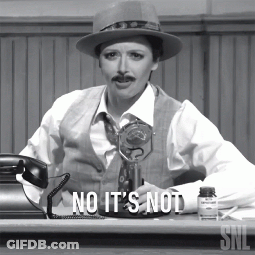 Woman At Desk Saying No It's Not GIF