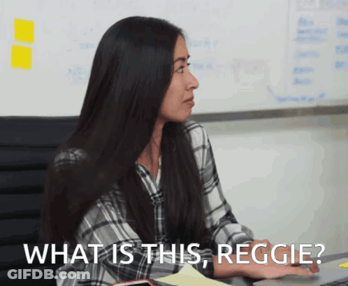 Woman At Desk Saying What Is This Reggie GIF