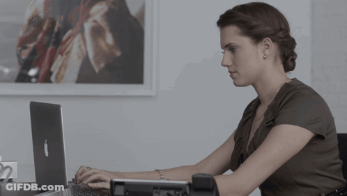 Woman At Desk With Apple Laptop GIF