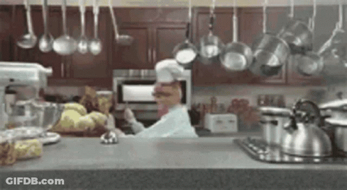 Woman At Desk With Keyboard Looking At Camera GIF