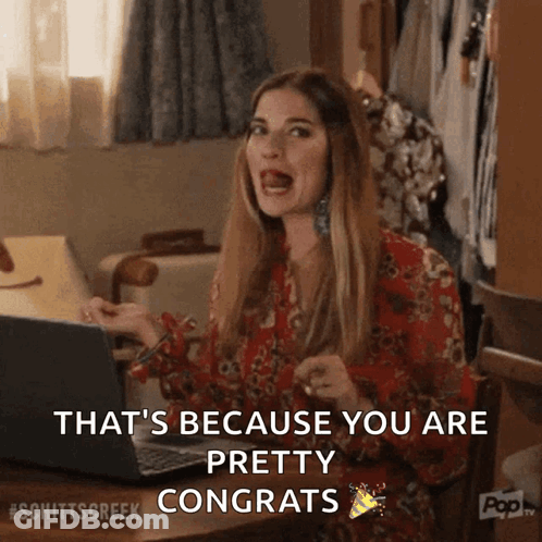 Woman At Desk With Laptop Says That's Because You Are Pretty Congrats GIF