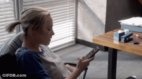 Woman At Desk With Tape Dispenser GIF