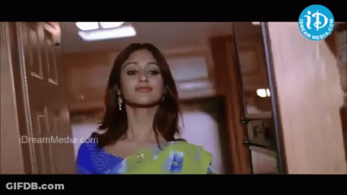 Woman At Door With Dreammedia.com Logo GIF