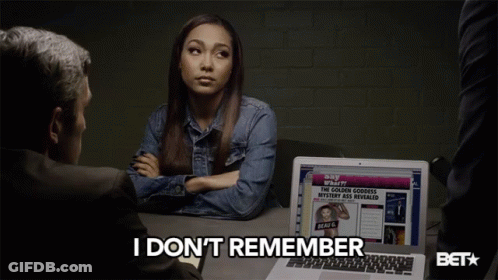 Woman At Laptop Saying I Don't Remember GIF