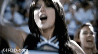 Woman At Microphone Holding Grammy Award GIF