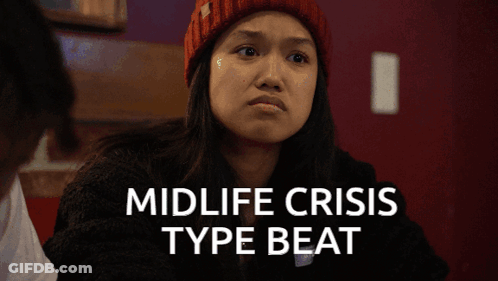 Woman At Microphone In Front Of Creepshow Poster GIF
