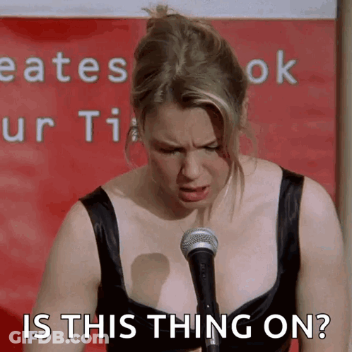 Woman At Microphone Saying Is This Thing On GIF