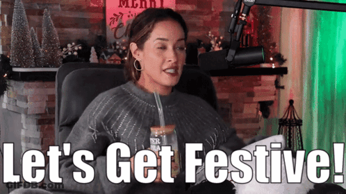 Woman At Microphone Saying Let's Get Festive GIF