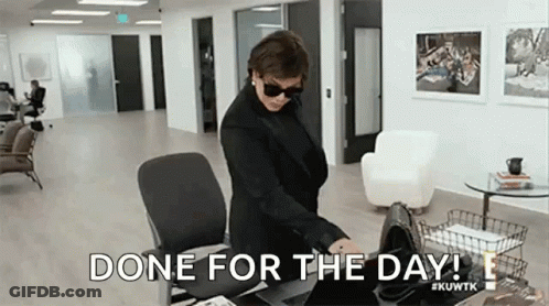 Woman At Office Desk Done For The Day GIF