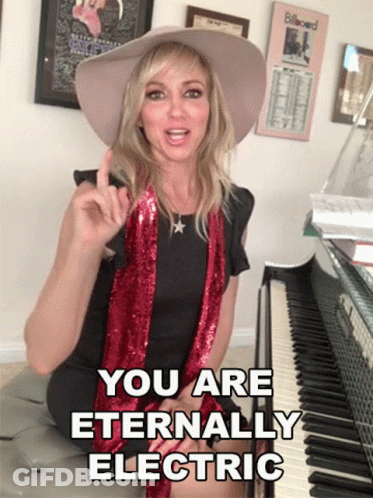 Woman At Piano Saying You Are Eternally Electric GIF