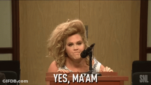 Woman At Podium Saying Yes GIF