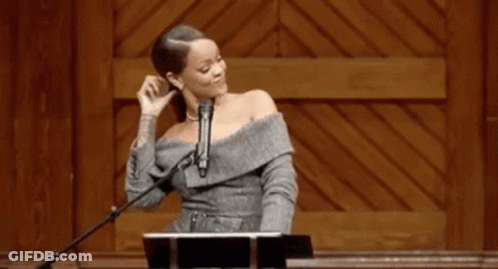 Woman At Podium With Microphone GIF