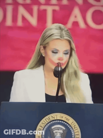 Woman At Presidential Podium GIF
