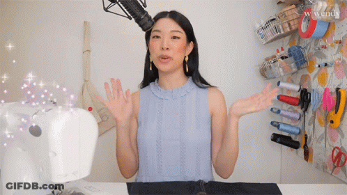 Woman At Sewing Machine Talking Into Microphone Wendy GIF