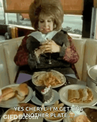 Woman At Table Saying Getting Another Plate GIF