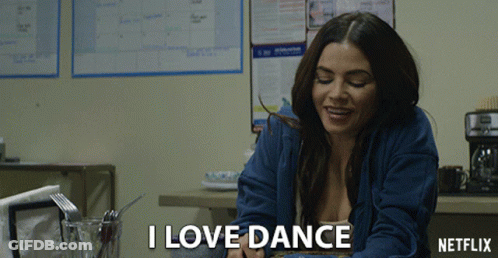 Woman At Table Saying I Love Dance GIF