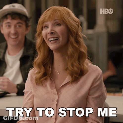 Woman At Table Saying Try To Stop Me GIF